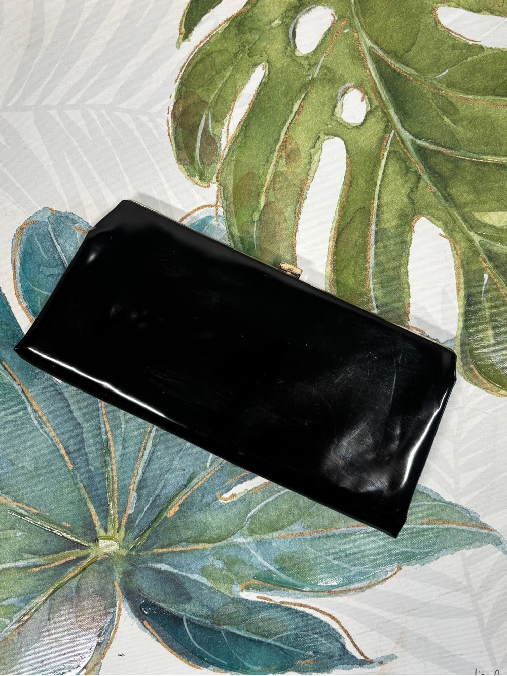 Sleek Black Patent Clutch